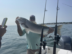 Clear skies and endless possibilities: the perfect day for fishing in Scituate!