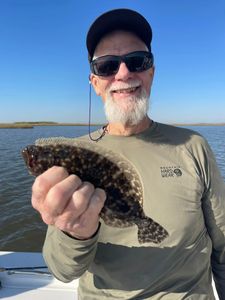 Flounder Hooked on New Orleans fishing!