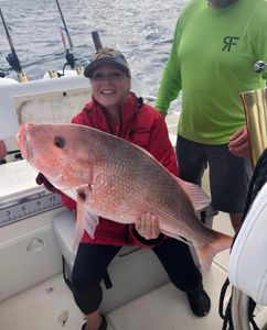 Red snapper caught while fishing in New Port Richey FL displayed on boat deck