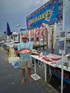 Angler with 2 big fish in Biloxi