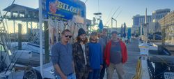 A group of 6 people fishing in Biloxi