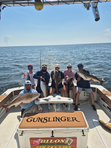Anglers reel in a huge catch of redfish off the coast of Biloxi!