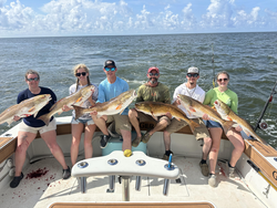 Anglers blast the redfish in Biloxi despite stormy weather!