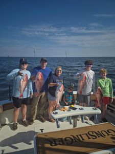 4 fish caught by 5 people in Biloxi