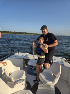 Two people fishing in Pottsboro