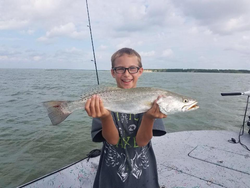 Angler with big 27-inch fish caught in Aransas Pass
