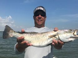 A spotted weakfish measuring 29 inches caught while fishing in Aransas Pass