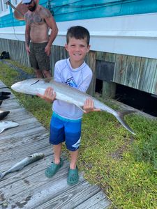 Anglers with a big fish caught in NC