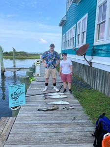 Two people fishing in Hatteras, North Carolina