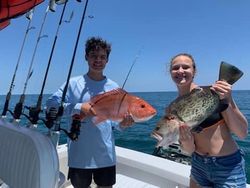 Two anglers fishing on the coast of Hatteras