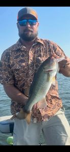 A person fishing in TX