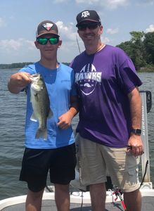 Fisherman catches a Florida bass while fishing in TX