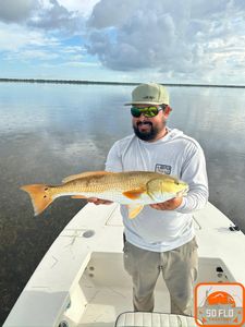 One person fishing on the shore in Islamorada