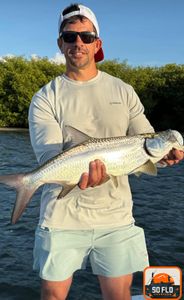 Angler catches a tarpon fish in Florida