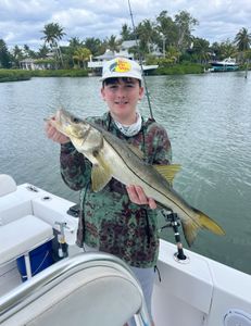 Angler with a big snook fish in Florida