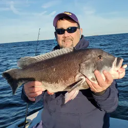 Two anglers fishing with rods in Narragansett