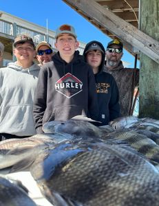 A group of 5 people fishing in Alabama