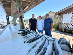 3 people fishing in Gulf Shores
