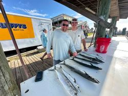 Fresh caught fish displayed on cleaning station at Gulf Shores AL fishing dock