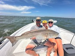 Large redfish caught during fishing trip in Gulf Shores AL on boat