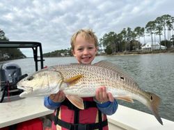 Redfish caught while fishing in Gulf Shores AL held on boat