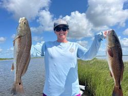 Two redfish caught during fishing trip in Gulf Shores Alabama