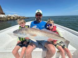 Large redfish caught during fishing trip in Gulf Shores Alabama