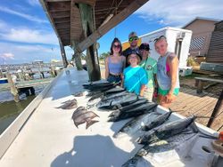 Spanish mackerel fishing catch displayed on boat dock in Gulf Shores AL