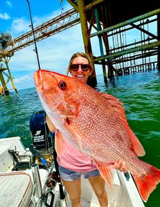 An angler with a 30-inch fish in Alabama