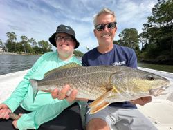 Redfish caught by two people in Gulf Shores