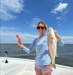 Angler fishing in beautiful Gulf Shores landscape
