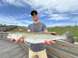 Nice speckled trout on light tackle today. Clouds rolling in but the fish are biting!