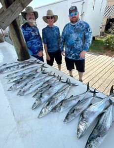 A group of 3 people fishing in AL