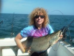 Angler fishing in Oswego