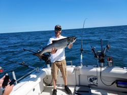 Angler with a 31-inch catch in Oswego