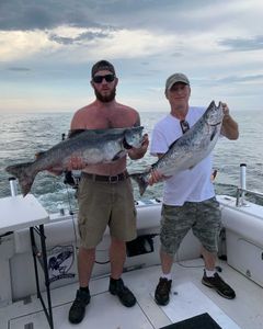 Two anglers fishing in Oswego