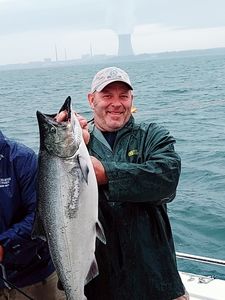 Chinook salmon caught by fisherman in Oswego