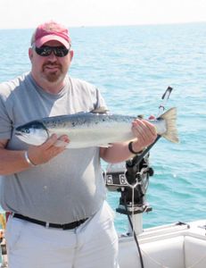 A person fishing in Oswego