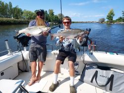 Two big rainbow trout caught fishing in NY