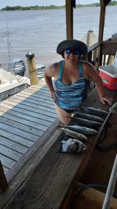 Angler holding a fish in MS