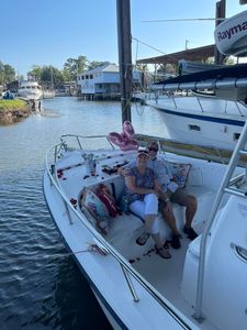 Two anglers enjoying a fishing cruise in MS