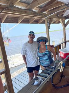 Two people enjoy a fishing trip in MS