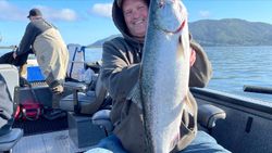 Angler holding a 24-inch fish in OR
