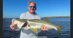 Snook, a big fish caught during a Florida fishing tour