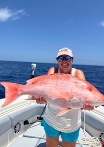 Person enjoying cruises, fishing, and tours in Matlacha