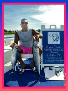 Angler catching 2 big fish in Calabash