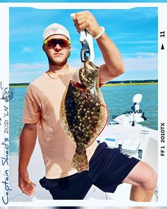 Fisherman catches a Southern Flounder in Calabash