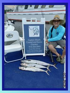 Two king mackerel, each about 24 inches long, caught while fishing in North Carolina