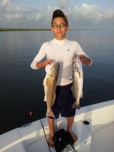 Fisherman with 2 fish in Galveston
