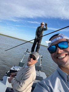 Two people fishing in TX